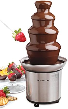 Chocolate fountain with flowing chocolate for dessert tables at events and parties