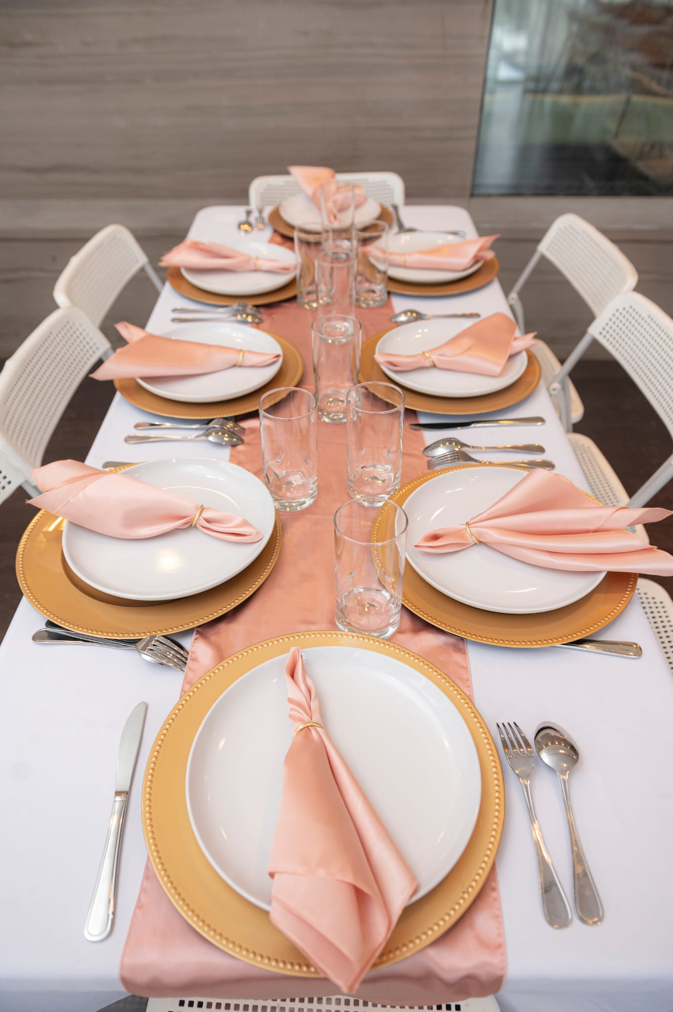 Event plates set of 12 stacked on a decorated banquet table