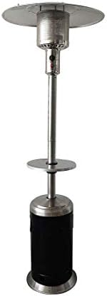 Outdoor propane tower heater warming a patio area at an evening event