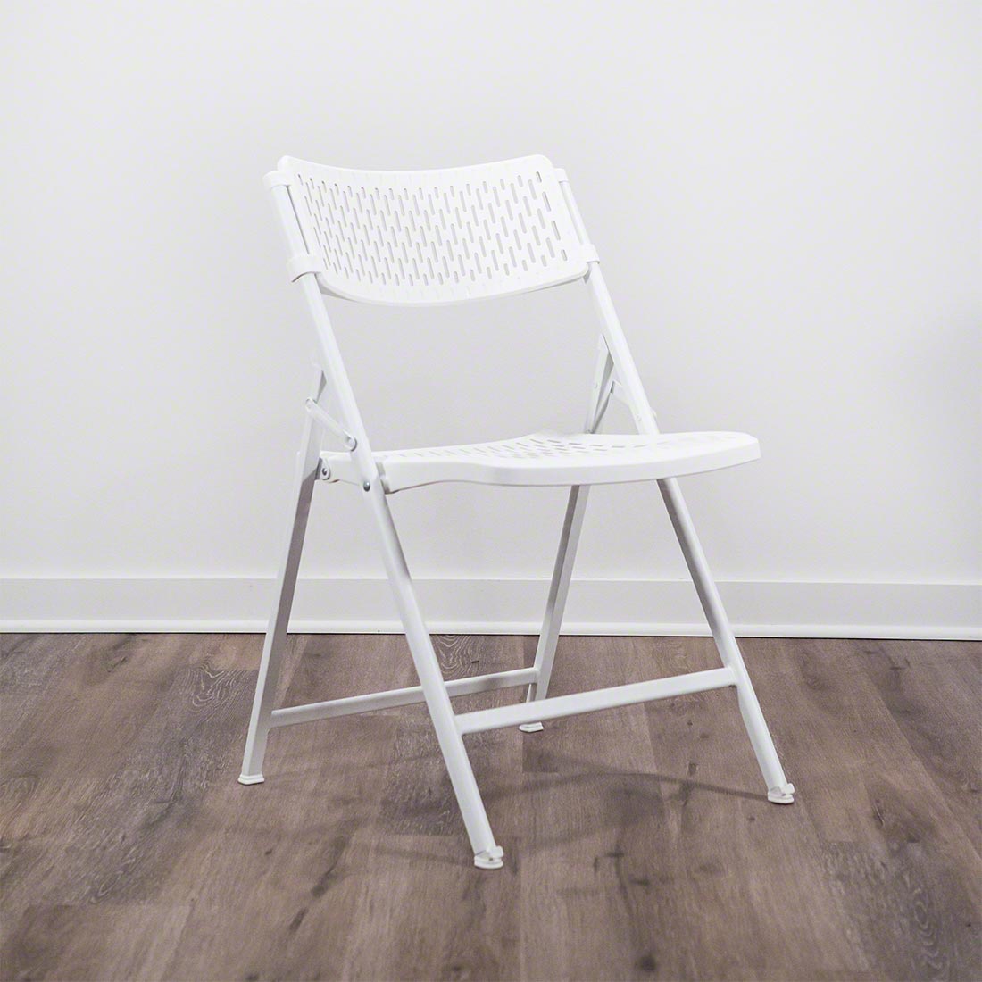 Folding white event chair with plastic seat and metal frame for indoor and outdoor seating