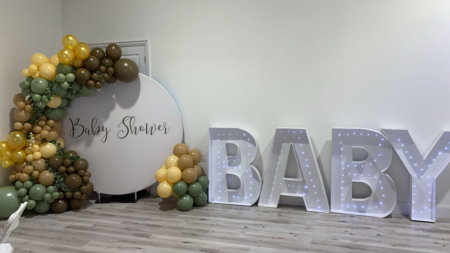 4-foot light-up letters spelling LOVE at an outdoor wedding event