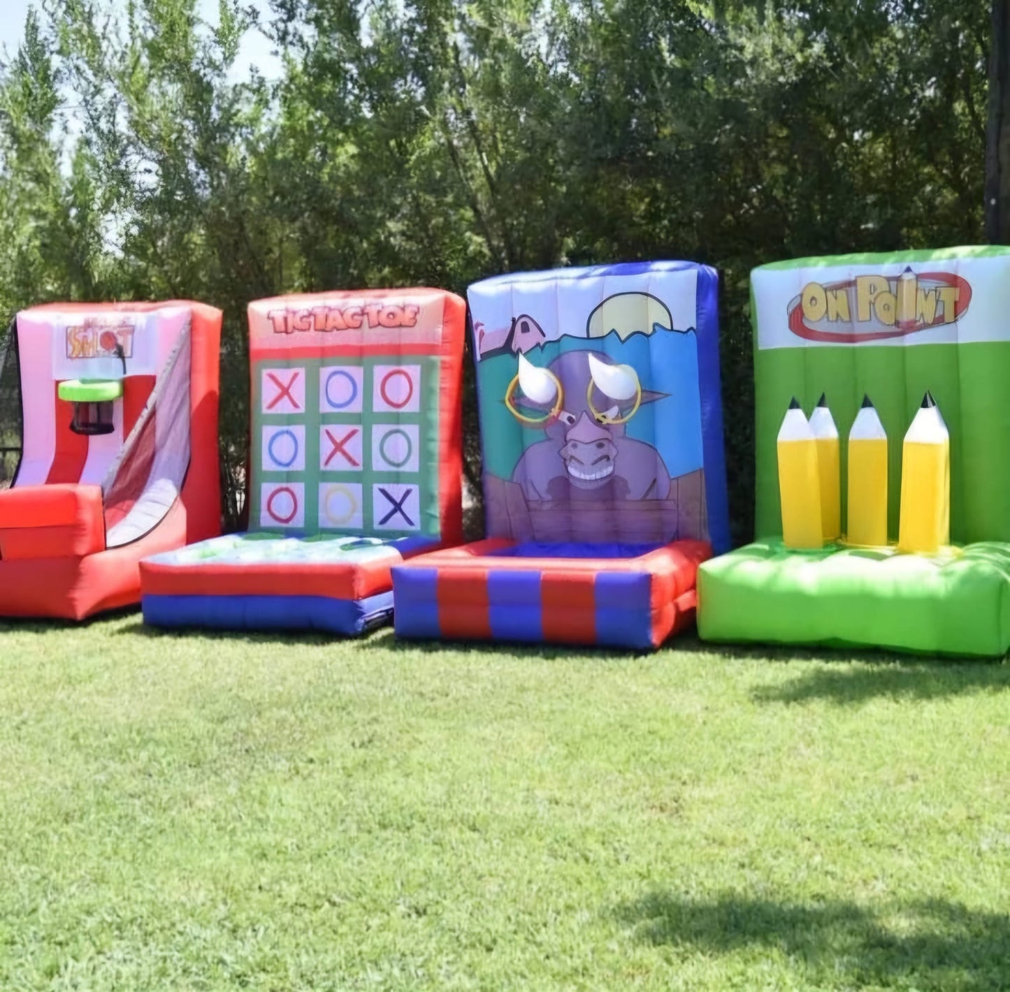 Carnival bouncy castle with basketball hoop, tic tac toe, target toss, and bull horn ring game for kids’ parties