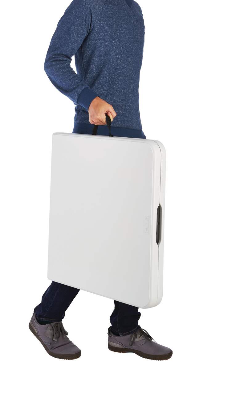 small folding 4 ft table for events white plastic with black frame