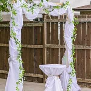 Decorative Wedding Arch with Table – Elegant Setup for Special Events